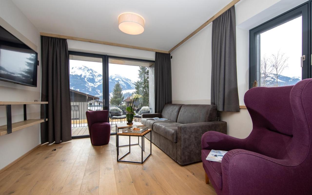 Emma Deluxe Aparthotel Mit Beheizten Aussenpool Direkt Beim Skibus Piesendorf Exterior photo