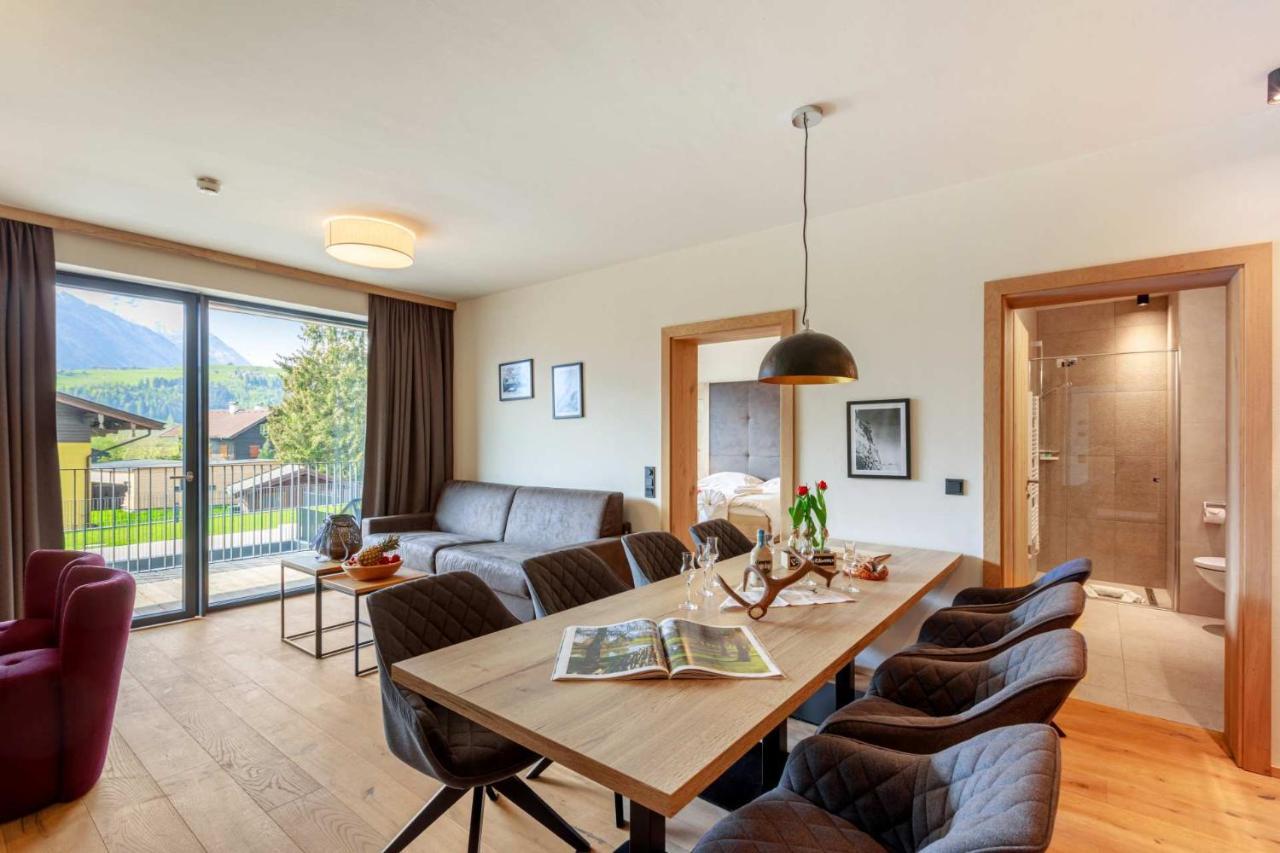 Emma Deluxe Aparthotel Mit Beheizten Aussenpool Direkt Beim Skibus Piesendorf Exterior photo